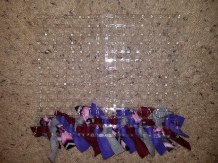 A few rows of the snuffle mat done.
