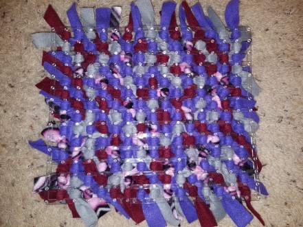 The back of a snuffle mat that only needs one direction done.