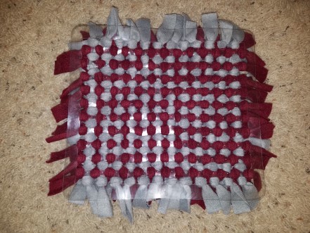 The back of a snuffle mat that needs both directions done.