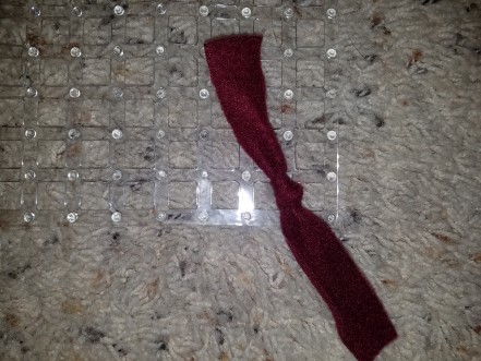 One fleece strip tied to the sink mat.