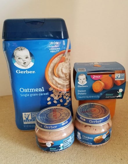Oatmeal baby cereal, sweet potato baby food, and chicken baby food.
