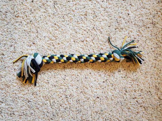 DIY green, yellow, and grey tug toy.