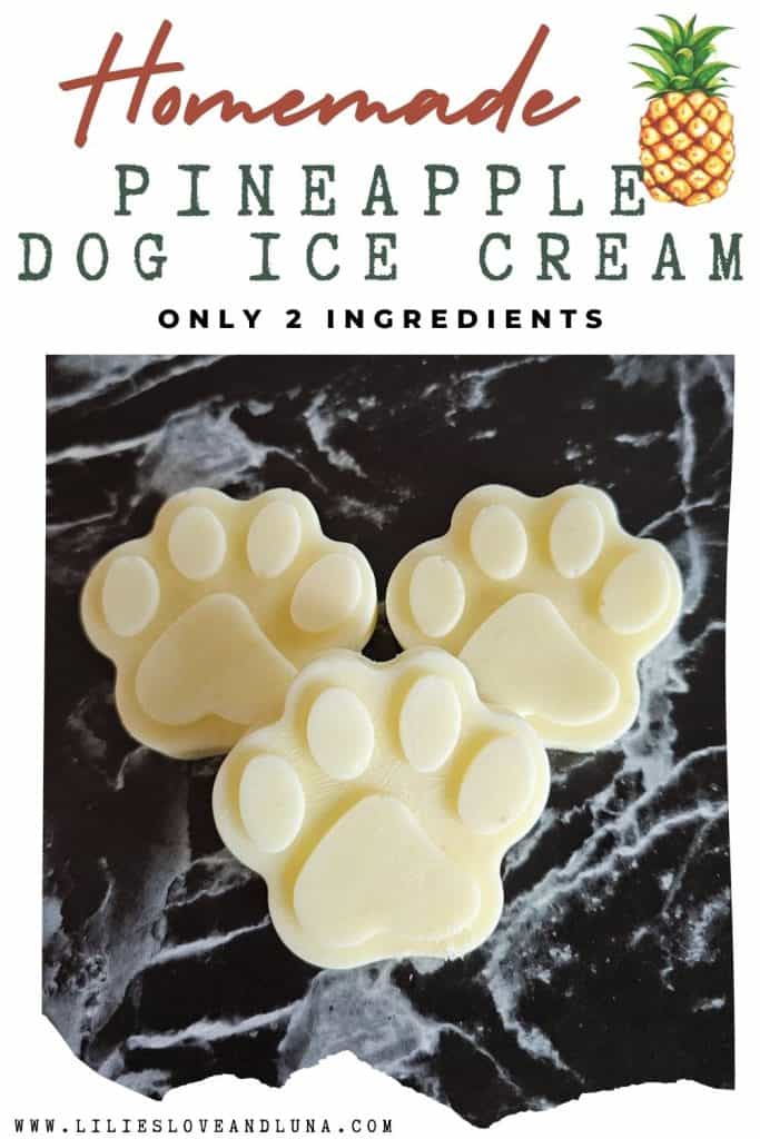 Three homemade pineapple dog ice cream treats shaped like paw prints are displayed against a dark marble background, promoting a recipe that uses only two ingredients for cold dog treats.