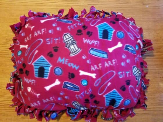 Finished fleece tie blanket dog bed.