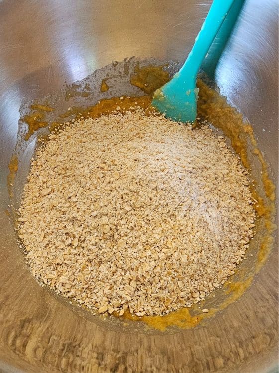 Ground oats added to the wet ingredients.