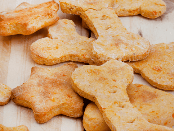 Close up of bone and star shaped dog treats.