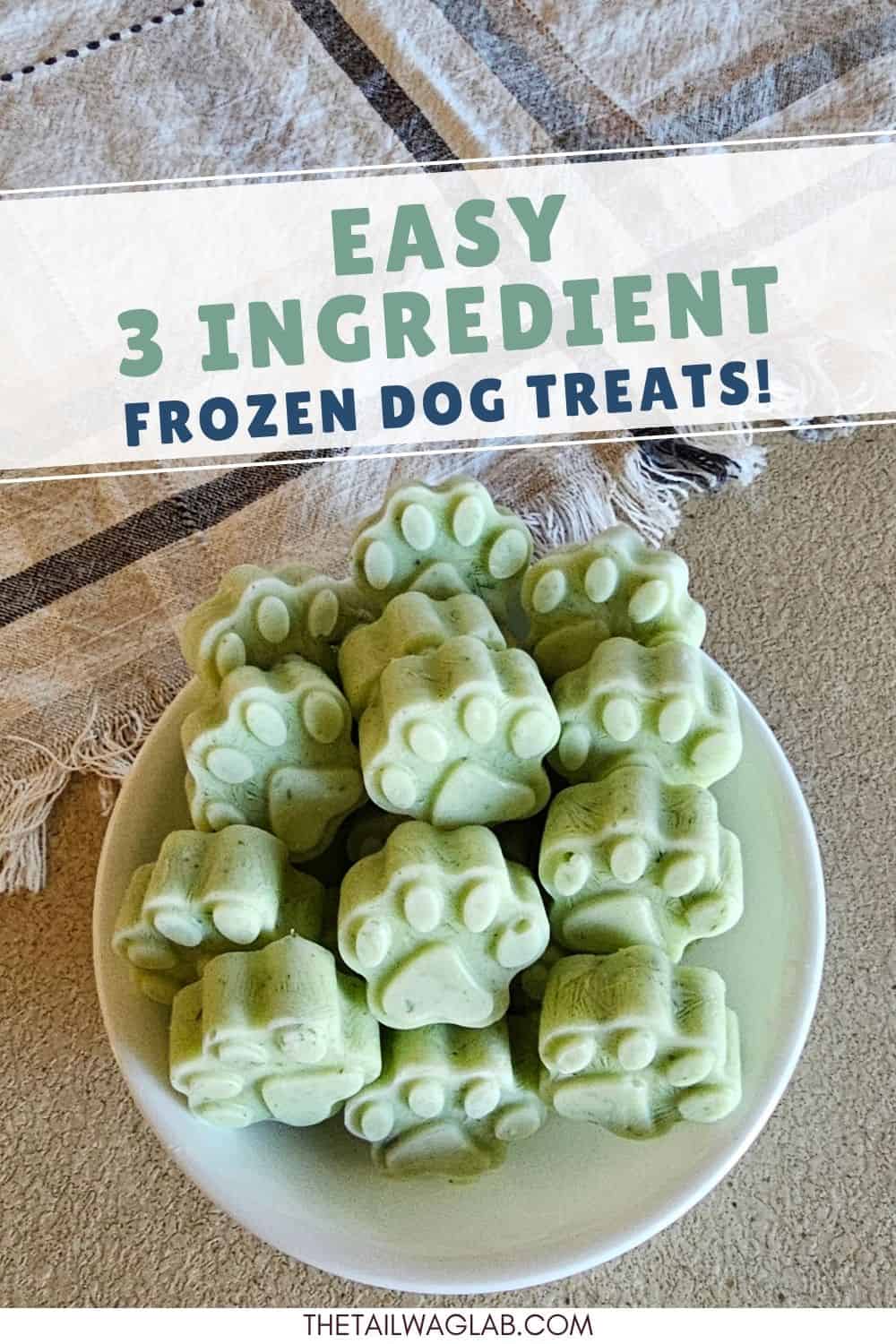 Easy 3 Ingredient Frozen Dog Treats made with just three simple ingredients. Pinterest pin showing green frozen dog treats in a bowl.