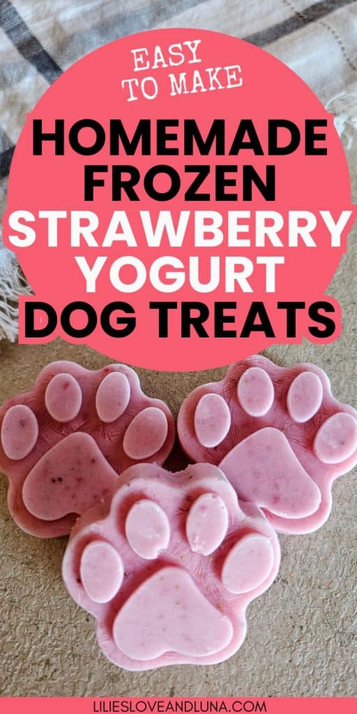 Three paw-shaped frozen dog treats made with strawberry yogurt are displayed, highlighting a homemade recipe for cold dog treats.