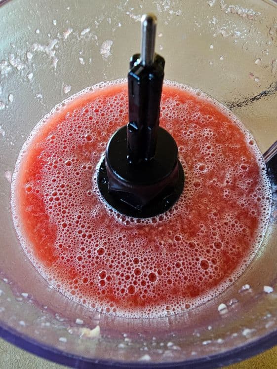 Banana, watermelon, and water after processing in the food processor.