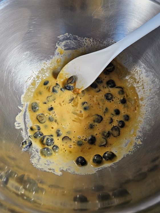 Blueberries mixed in the wet ingredients.
