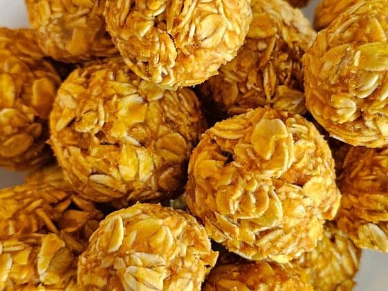 A close-up of no bake carrot applesauce dog treats.