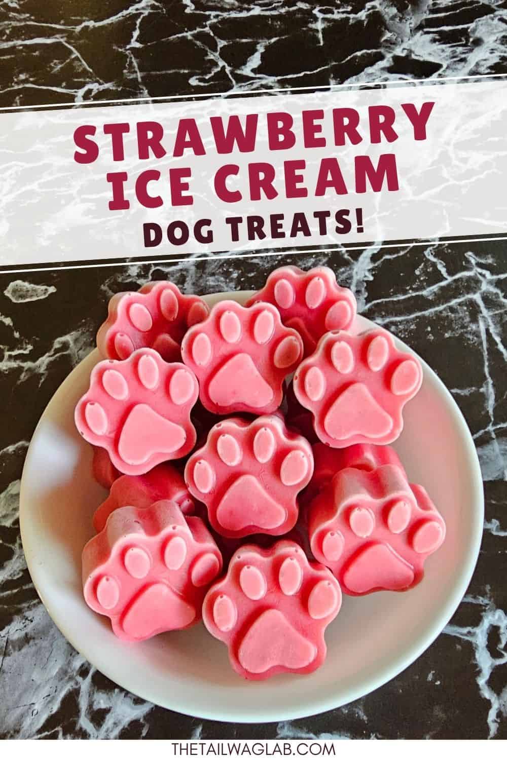 Dog-friendly strawberry ice cream treats shaped like paw prints in a bowl.