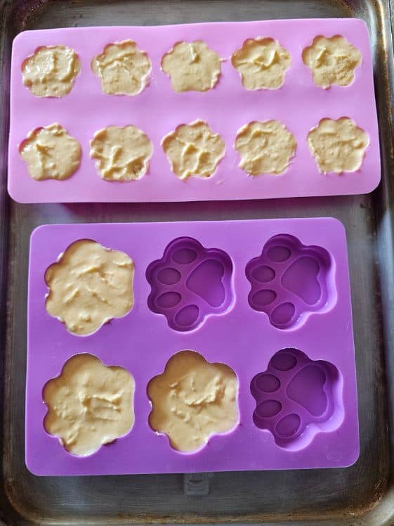 Sweet potato ice cream for dogs in paw shaped silicone molds.