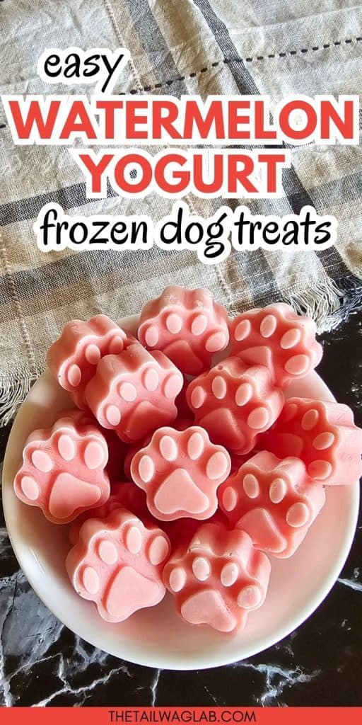 A bowl of pink paw-shaped watermelon yogurt frozen dog treats with the text "Easy Watermelon Yogurt Frozen Dog Treats."