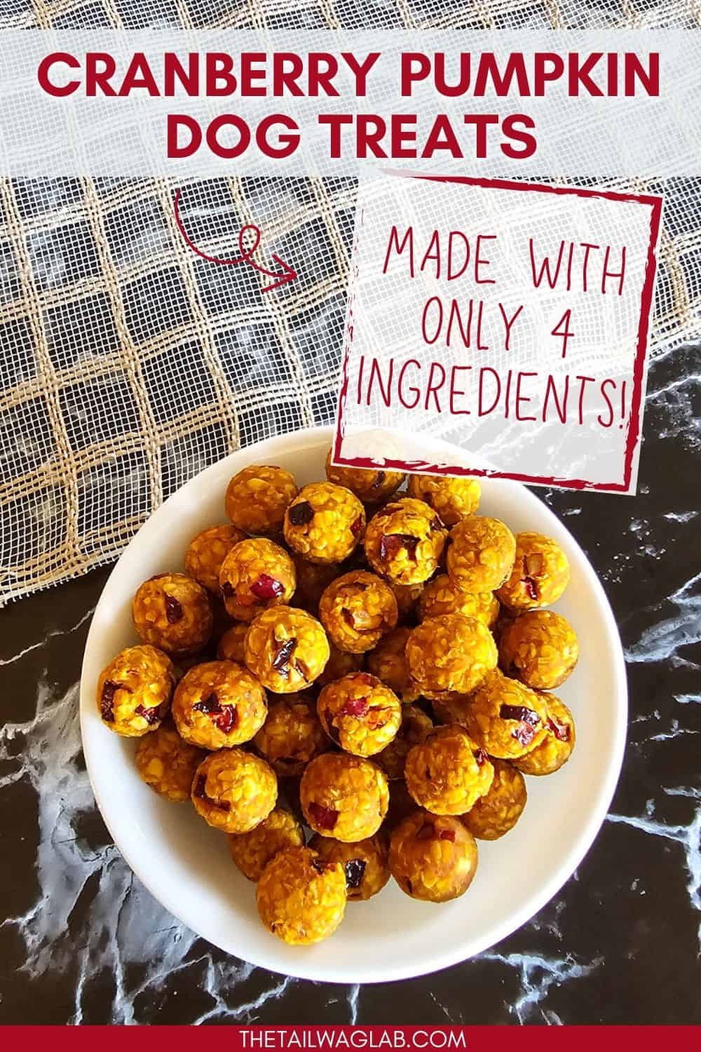 A plate of homemade cranberry pumpkin dog treats is displayed, featuring small, round, orange treats made with only four ingredients.