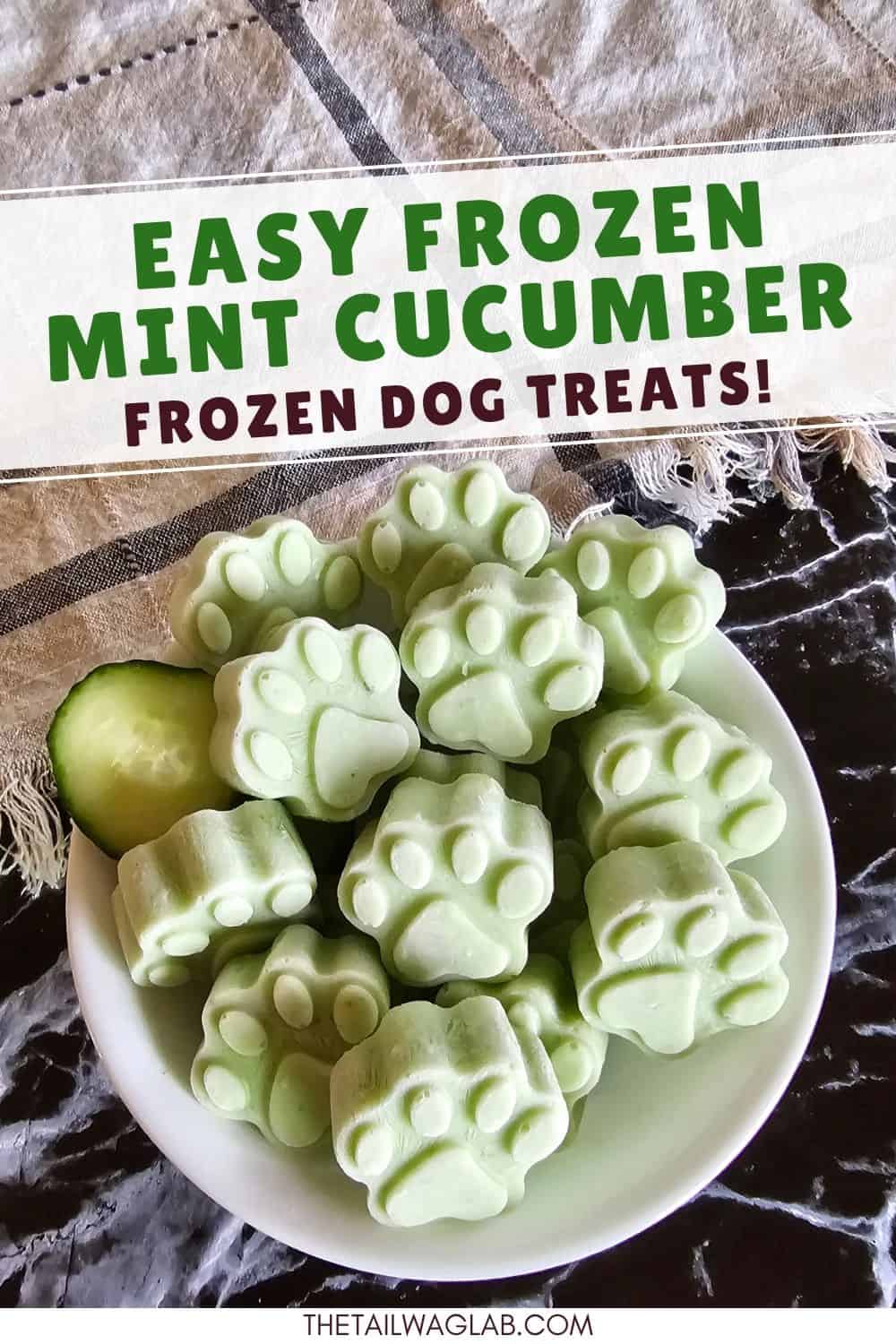 Bowl of homemade frozen cucumber mint dog treats shaped like paws. Text reads, "Easy Frozen Mint Cucumber Frozen Dog Treats!"