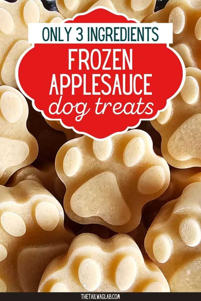 Frozen applesauce dog treats in paw-print shapes with text that reads "Only 3 Ingredients Frozen Applesauce Dog Treats." A quick and easy homemade dog treat recipe for everyday dog owners.